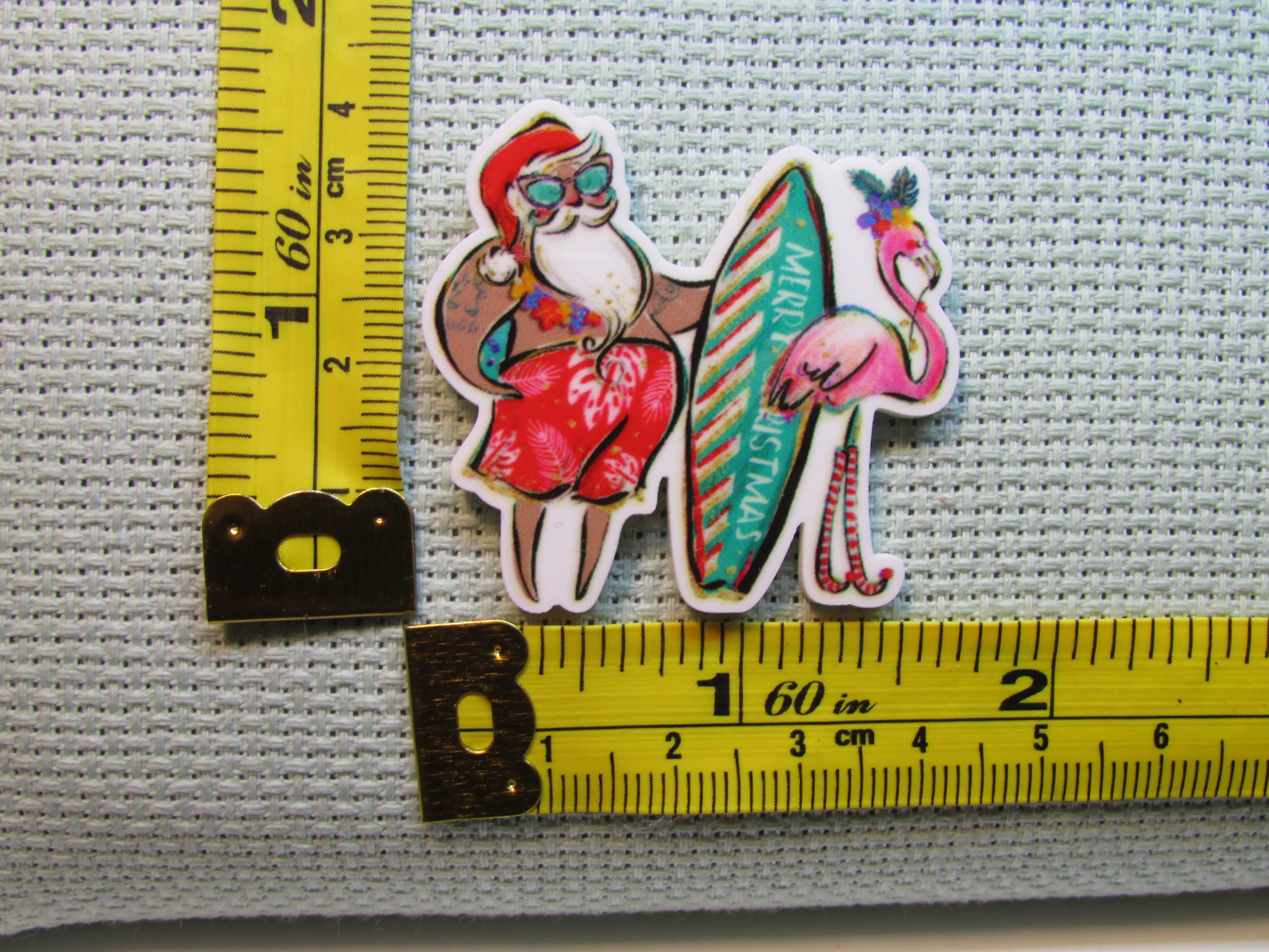 Surfing Santa with a Flamingo Needle Minder, Cover Minder, Magnet